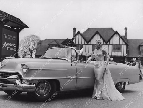 Diana Dors and her new Cadillac outside Pinewood Studios 8b20-13942