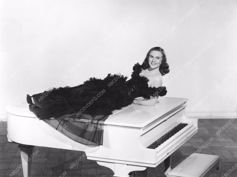 beautiful Deanna Durbin laying on grand piano film I'll Be Yours 8b20-14252