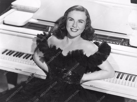 Deanna Durbin posing at the piano film I'll Be Yours 8b20-14254
