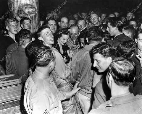 Deanna Durbin has long line of autographs to sign for servicemen 8b20-14318