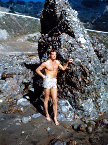 Guy Madison in swim trunks absorbs a little sunshine 8b20-14423