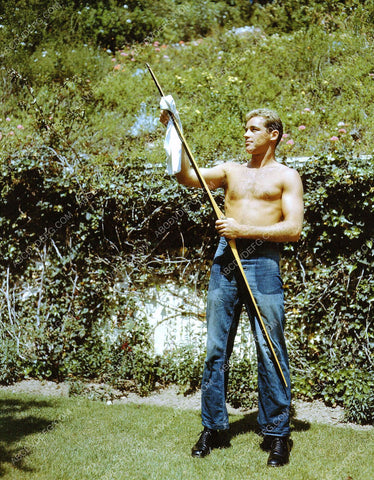 athletic Guy Madison cleaning his bow for some archery 8b20-14440