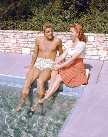 candid Guy Madison Shirley Temple sit poolside dangle feet in water 8b20-14441