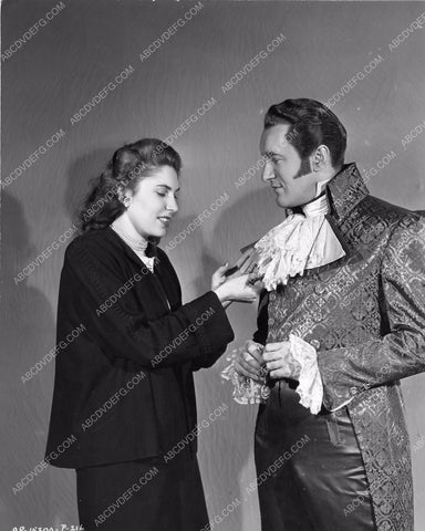 candid George Sanders gets a wardrobe adjustment 8b20-14462