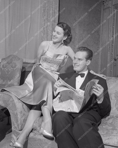 Charlton Heston and wife ready to go out 8b20-14996