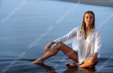 beautiful Bo Derek sitting on the beach 8b20-15497