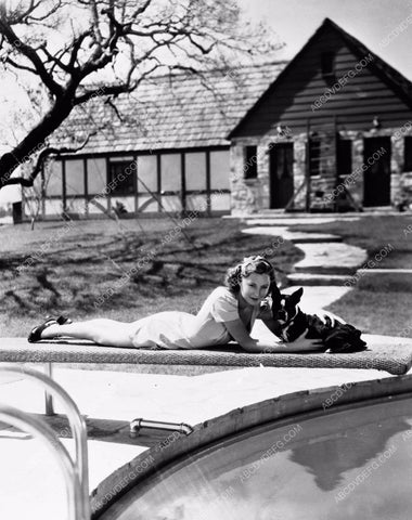 Barbara Stanwyck and her cute dog laying on the diving board 8b20-15544