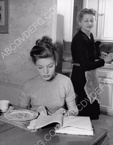 candid Lauren Bacall going over the script 8b20-16656
