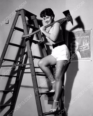 May Wynn takes a hatchet up a ladder cute pinup pose 8b20-1665