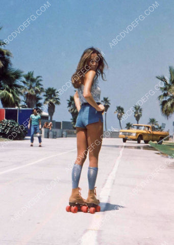 sexy Catherine Bach in her daisy dukes roller skating on the boardwalk 8b20-16666