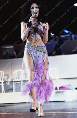 Cher singing in one of her sexy outfits 8b20-16702