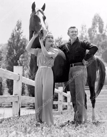 Carole Lombard Clark Gable taking care of the horses 8b20-16773