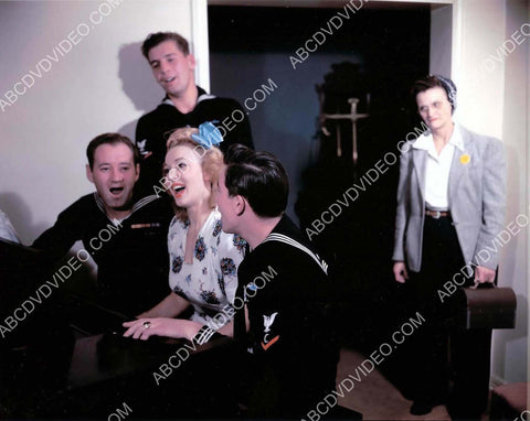 Carole Landis at the piano singing w the sailors 8b20-17097