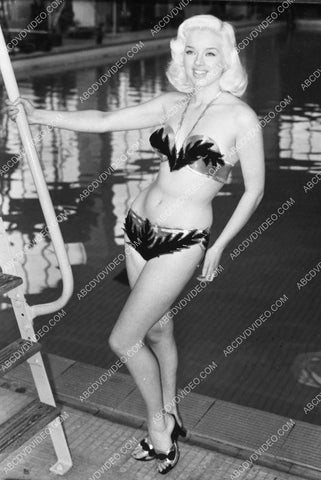 shapely Diana Dors models her new sexy bikini by the pool 8b20-17314