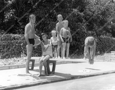Chuck Connors and the family in their swimming pool 8b20-17544