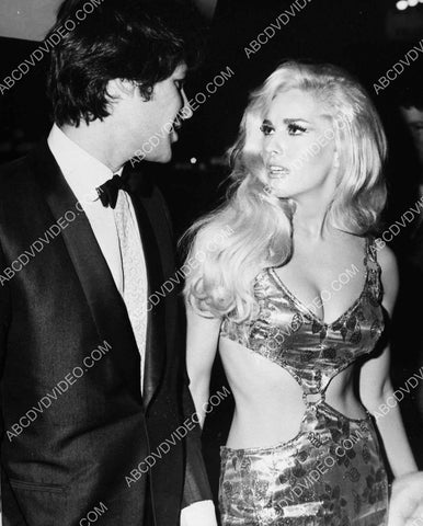 bombshell Edy Williams and date at some event 8b20-18274