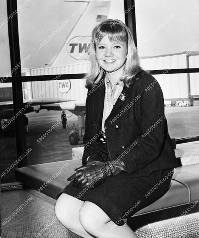 Hayley Mills sitting at the airport 8b20-18436