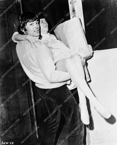 Peter Duel bringing in the groceries and Judy Carne 8b20-18859