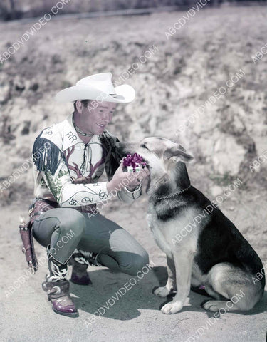 Roy Rogers gives his dog Bullett his Christmas present 8b20-18975