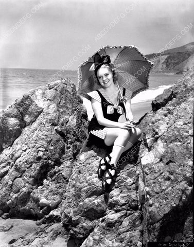 Alice Faye gay 90's swimwear w parasol at the beach on the rocks 8b20-1908