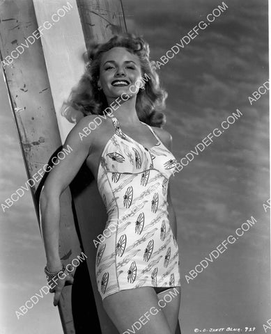 shapely Janet Blair leaning on a surfboard in her new swimsuit 8b20-20455