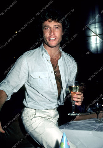 Andy Gibb and a glass of wine 8b20-2048