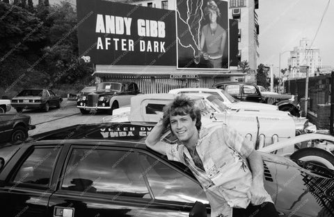 Andy Gibb in front of his billboard on Sunset Blvd portrait 8b20-2070