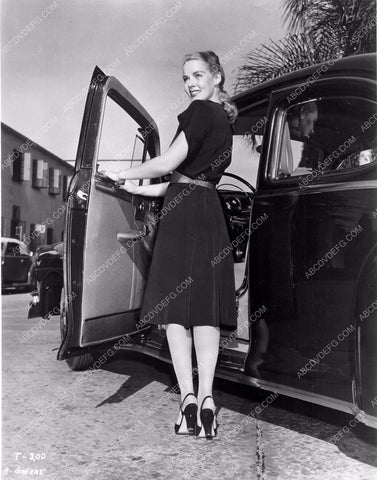 Angela Greene gets in her new automobile 8b20-2100