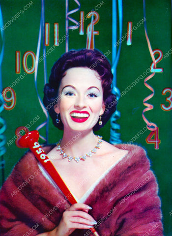 Ann Blythe helps ring in 1956 New Year 8b20-2304
