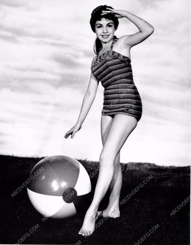 Annette Funicello in her new swimwear plays w a beachball 8b20-2891