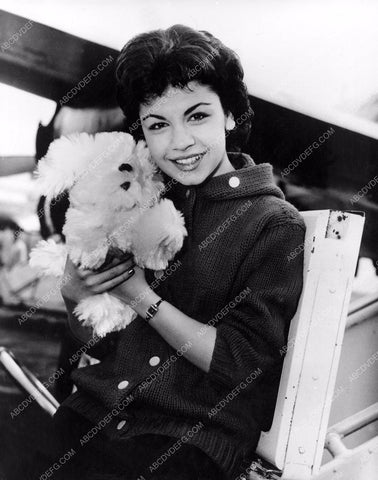 Annette Funicello behind the scenes with a stuffed animal dog 8b20-2933