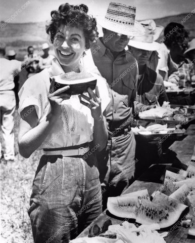 candid photo Ava Gardner gets slice of water melon of craft service table 8b20-3023