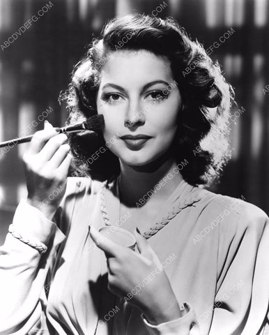 beautiful Ava Gardner applies a little base makeup with brush 8b20-3069