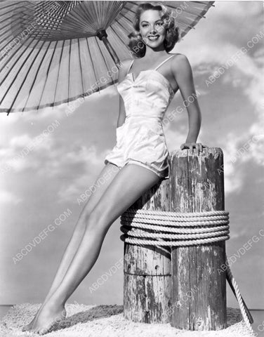 beautiful Barbara Lawrence models her new swimwear standing on toes 8b20-3323