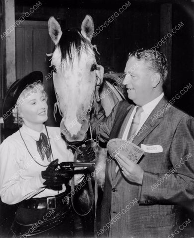 Barbara Stanwyck clowning around behind scenes The Maverick Queen 8b20-3592