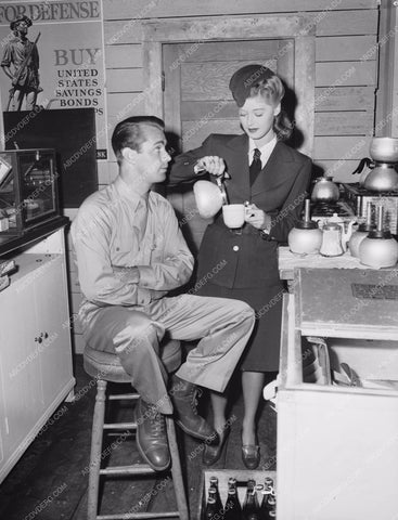 candid Alan Ladd gets a cup of coffee behind the scenes 8b20-3652