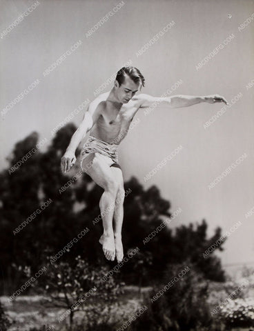 shirtless athletic Alan Ladd must be on a trampolene 8b20-3660