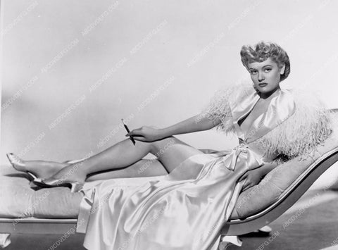 beautiful Alexis Smith w cigarette holder on chaise lounge 8b20-3667