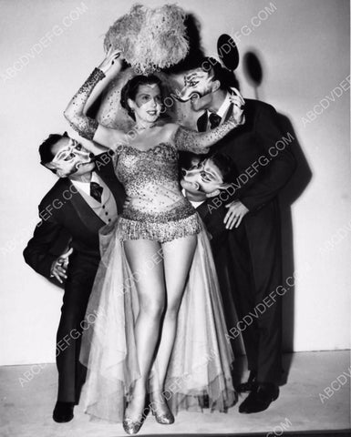 Ann Miller with folks ready for masquerade party dp-4100