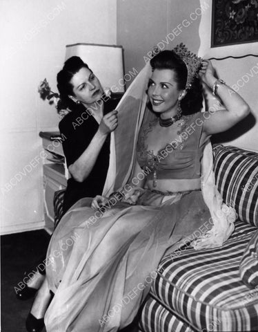 Ann Miller gets wardrobe adjustment in dressing room dp-4104