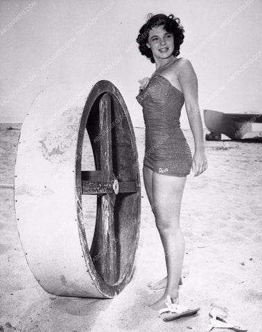 Anne Bancroft at the beach w old school tractor wheek 8b20-4163
