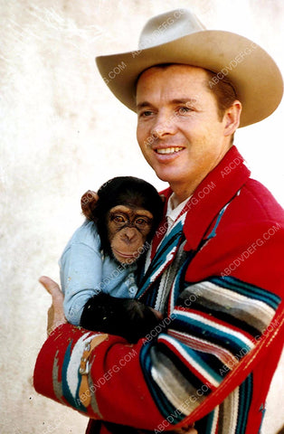 Audie Murphy holding a monkey 8b20-4427