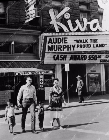 Audie Murphy in font of theater marquee w Walk the Proud Land playing 8b20-4446