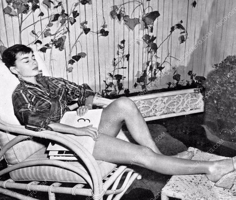 candid Audrey Hepburn listens to some records 8b20-4559