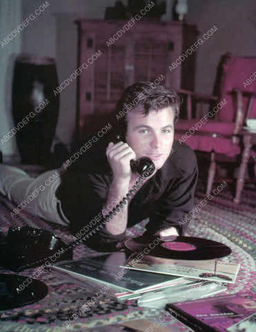 Barry Coe listens to some records and takes a telephone call 8b20-4660