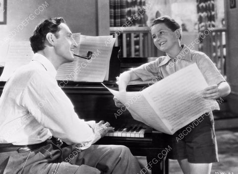 Basil Rathbone at the piano w Bobby Breen I think 8b20-4670