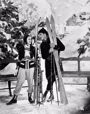 Basil Rathbone and girl ready for winter skiing season 8b20-4675