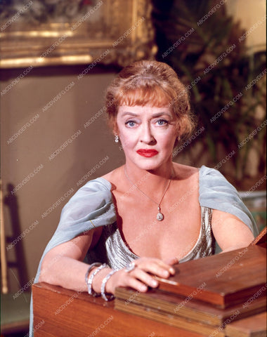 Bette Davis sitting at the piano 8b20-4750