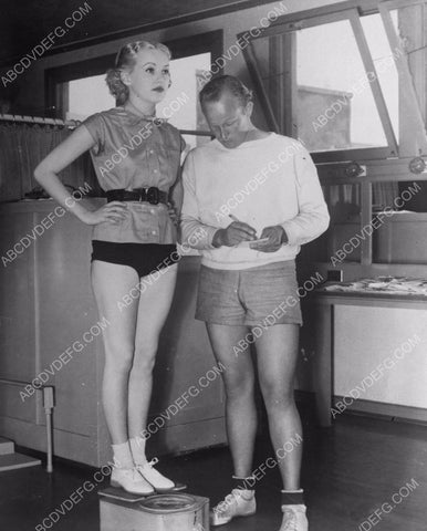 candid Betty Grable standing on the scale (gets paid by the pound maybe)8b20-4808