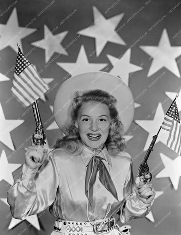 Betty Hutton patriotic cute cowgirl w American Flag six shooters pinup 8b20-4920